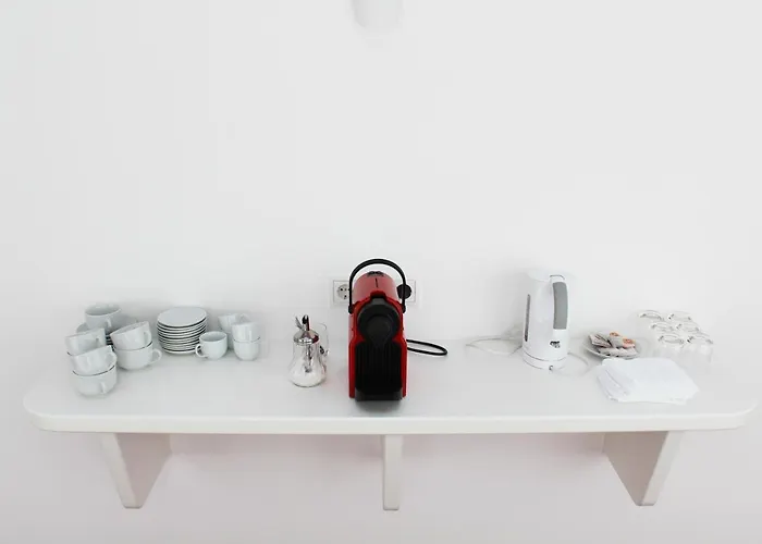 曼佐尼客房酒店